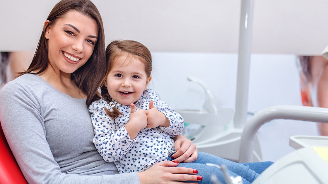 woman with child smiling